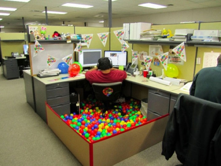 25 Office Pranks - A cubicle with a ball pit makes work fun.