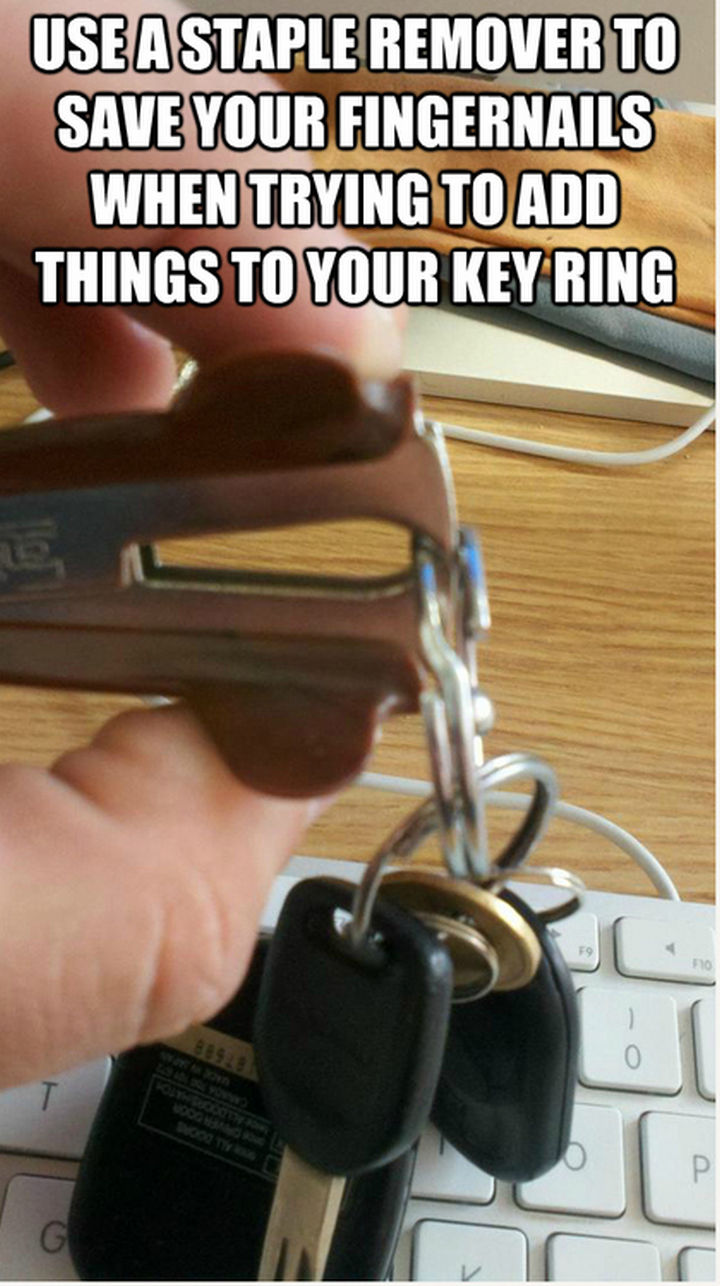 52 Cleaning and Life Hacks - Use a staple remover to save your fingernails when trying to add things to your key ring.