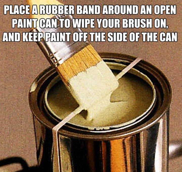 52 Cleaning and Life Hacks - Place a rubber band around an open paint can to wipe your brush on, and keep paint off the side of the can.