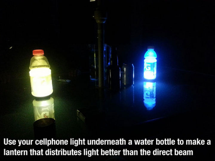 52 Cleaning and Life Hacks - Use your cellphone light underneath a water bottle to make a lantern that distributes light better than the direct beam.