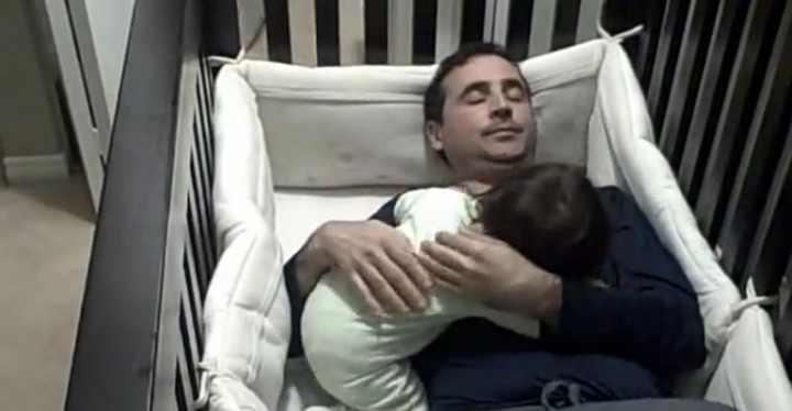 Dad Tries to Comfort His Baby Daughter and Sleeps in Her Crib.