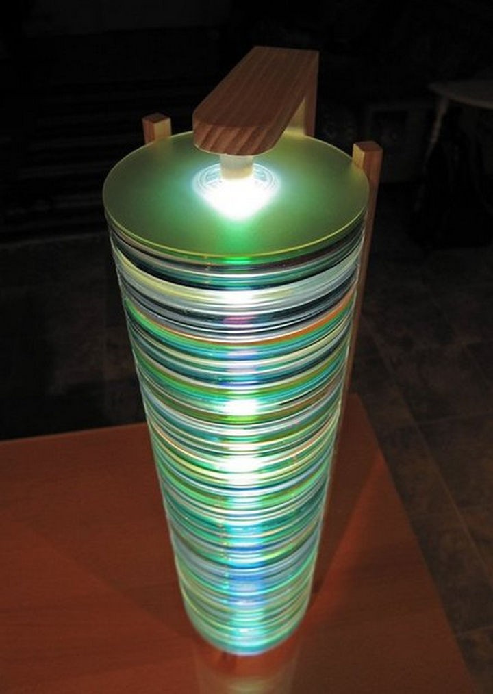 16 DIY Projects Using Old and Scratched CDs - Build a futuristic-looking lamp from a stack of CDs.