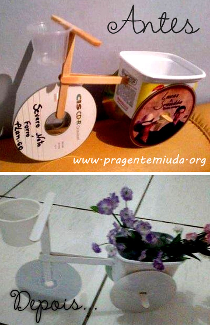 16 DIY Projects Using Old and Scratched CDs - Build a tricycle flower pot.