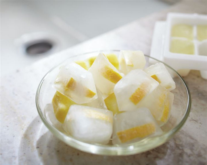 16 Cleaning Tips and Hacks - Clean your garbage disposal with ice cubes and lemon rinds.