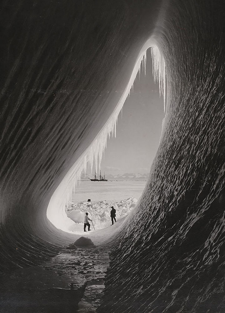 21 Historical Photos - Grotto in an iceberg, photographed during the British Antarctic Expedition, 1911.