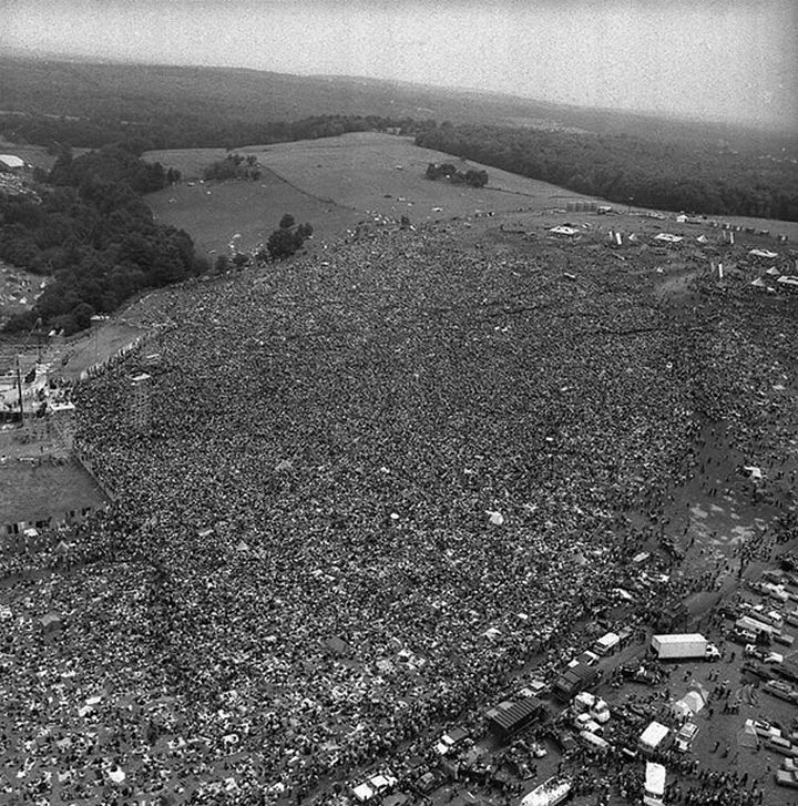 21 Historical Photos - Peaceful crowds gather for the first Woodstock, 1969.