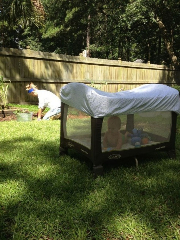24 Life Hacks for Kids - Prevent flies, mosquitoes, or other insects from harming your child by putting a blanket over their playpen.