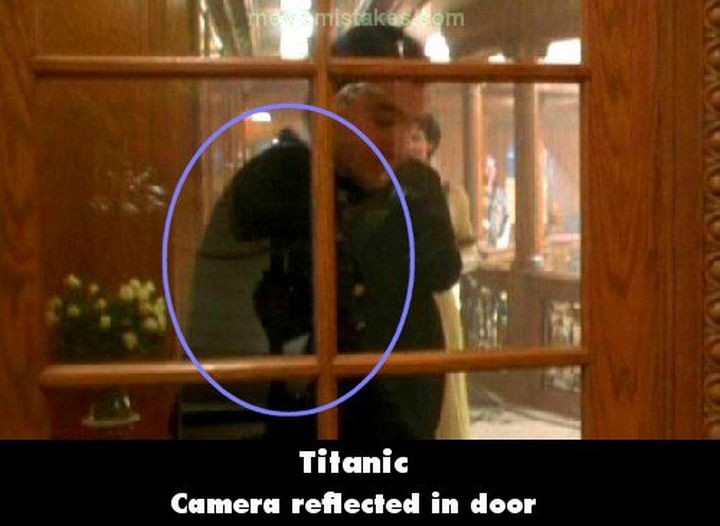 20 Titanic Movie Mistakes - Camera reflected in door.