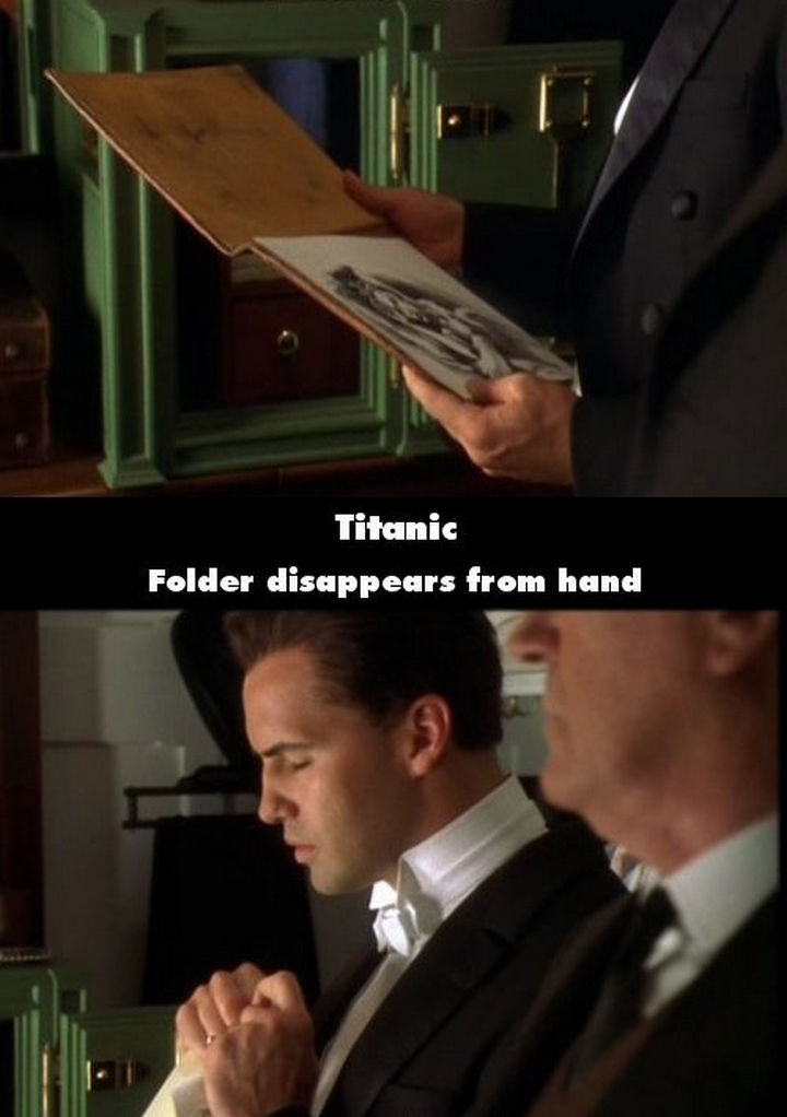 20 Titanic Movie Mistakes - Folder disappears from hand.