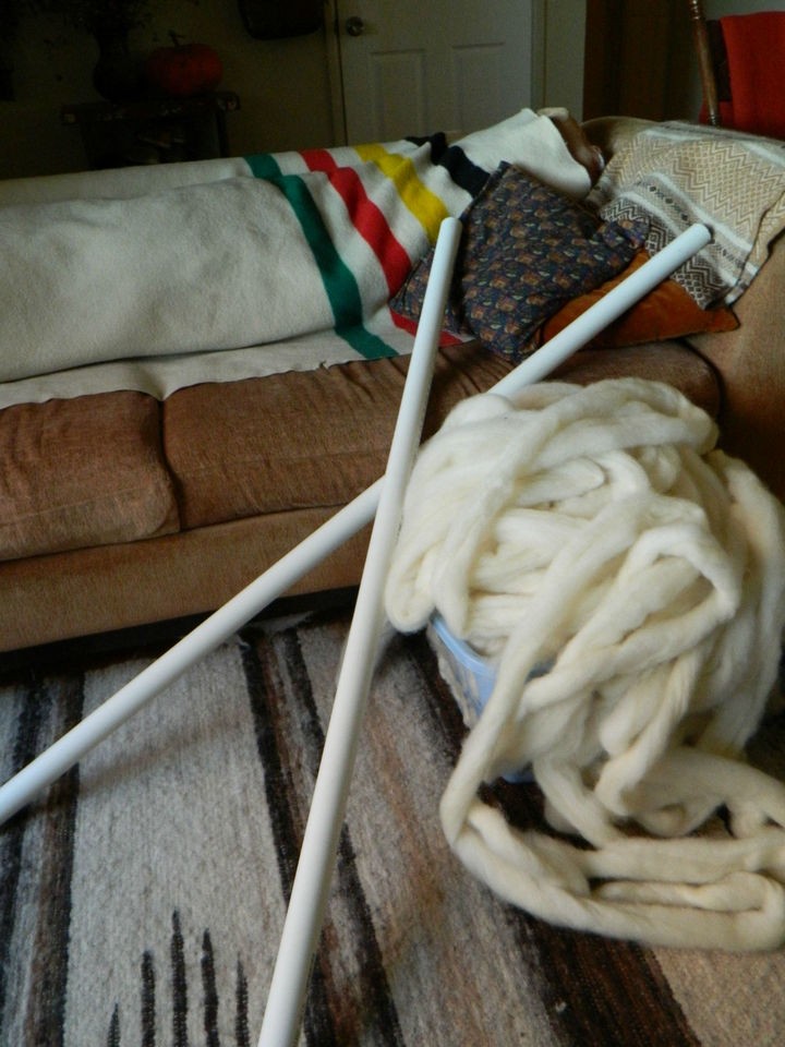 Tools of the trade. She used long pieces of PVC pipes for knitting needles.