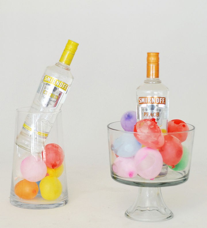 16 Party Hacks - Use frozen water balloons to keep drinks cold.