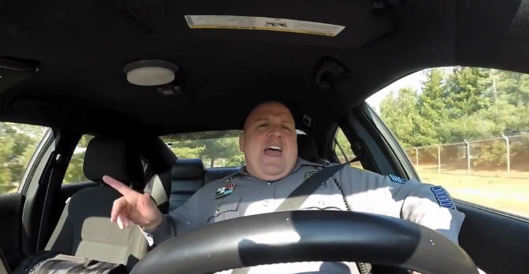 This Police Officer Was Caught Doing Something in His Police Car That Will Have You Smiling