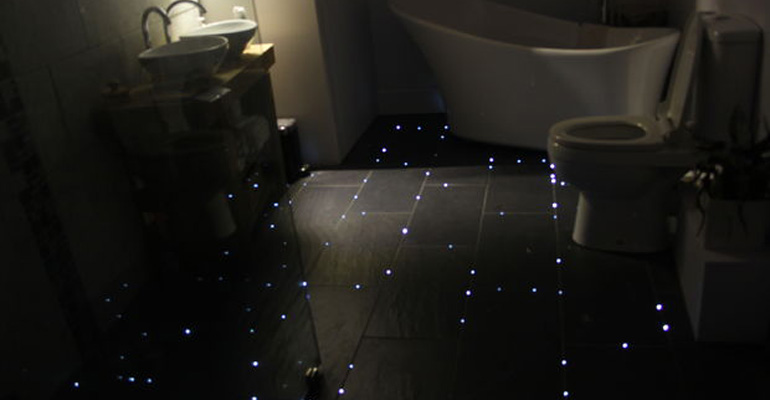 One Man Transformed His Bathroom Floor to Look Like a Sky Full of Stars