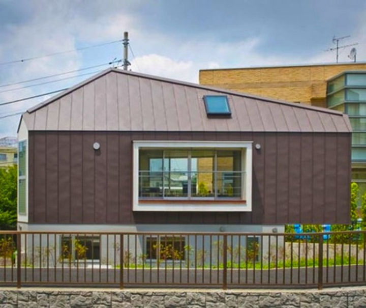 Small House Design in Japan - The triangular home features plenty of windows to let natural light in.