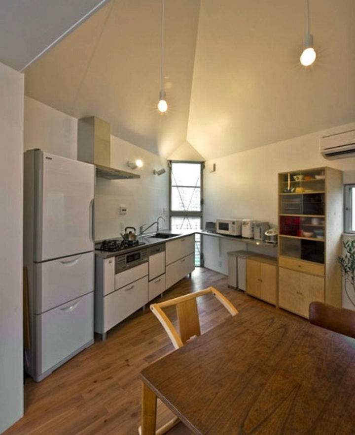 Small House Design in Japan - The kitchen and dining area offers a surprising amount of space and has all the amenities of a standard kitchen.