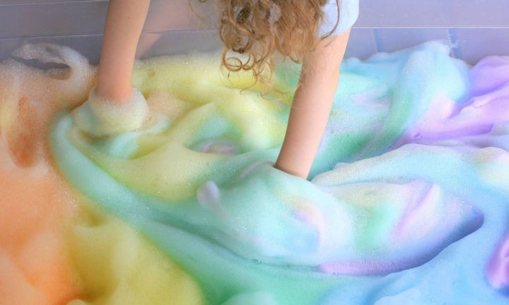 Soap foam bubbles are even better activities for kids when they have all the colors of a rainbow.