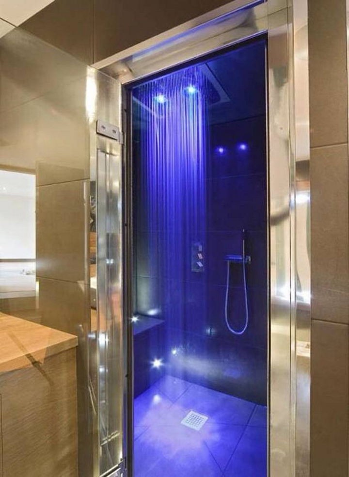 13 Beautiful Showers - Rainfall shower with neon lights.