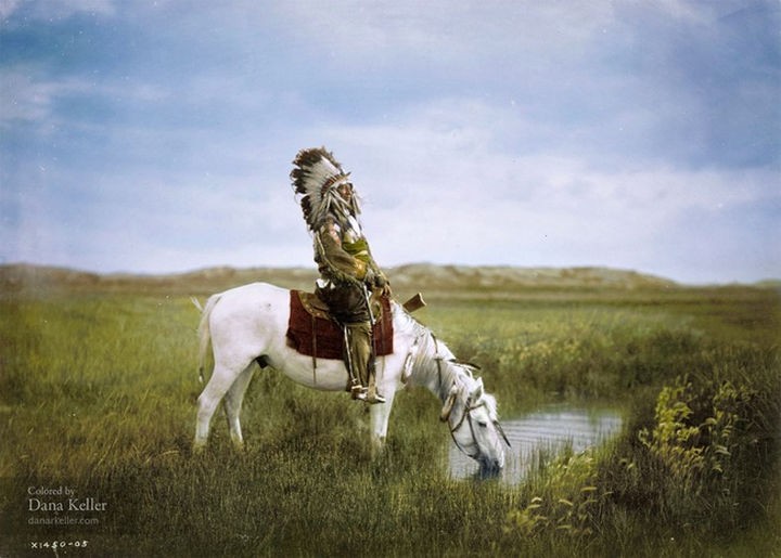 58 Colorized Photos from the Past - Red Hawk of the Oglala Sioux on horseback in the Badlands of South Dakota, 1905.