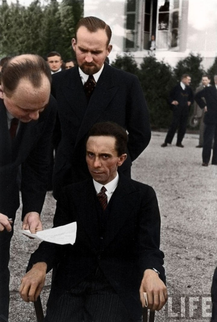 58 Colorized Photos from the Past - Nazi Minister of Propaganda Joseph Goebbels scowls at a Jewish photographer in 1933.