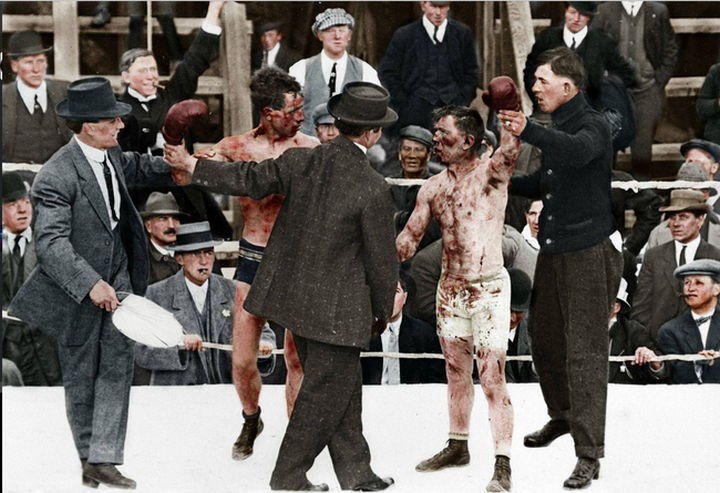 58 Colorized Photos from the Past - Two boxers after a boxing event.