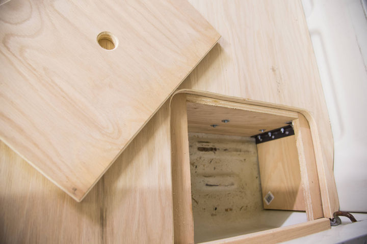 Because of the extra room on each side of the drawer, he added a compartment for a battery.