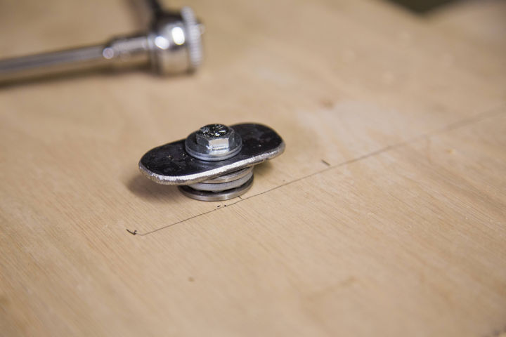 To secure the top sheet in place, a special 'lock' was built with washers.