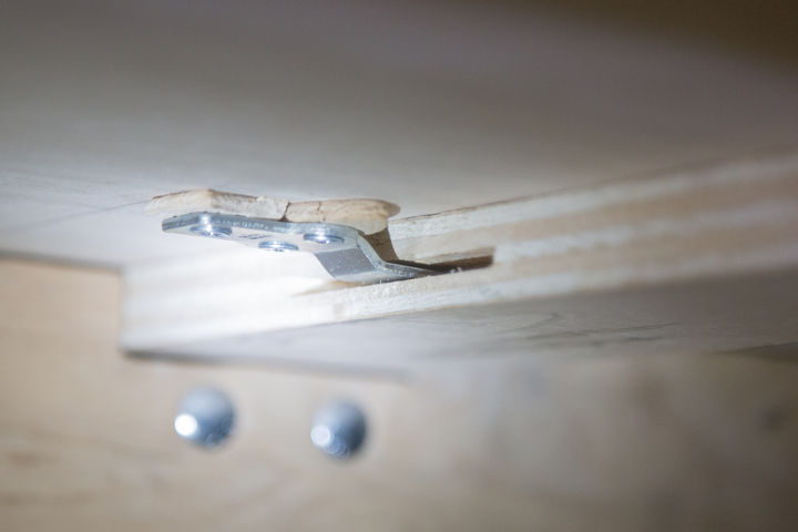 The front part of the locking system for the top sheet and a biscuit joiner was used to cut out slots for the latches.