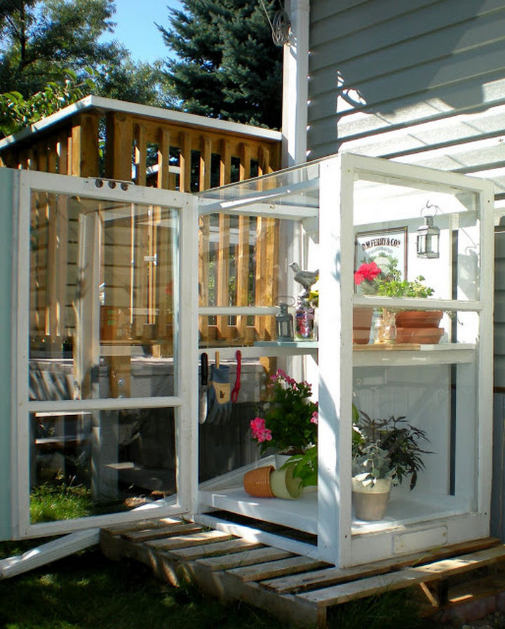 34 DIY Backyard Ideas for the Summer - Build a personal greenhouse by reusing old storm windows.