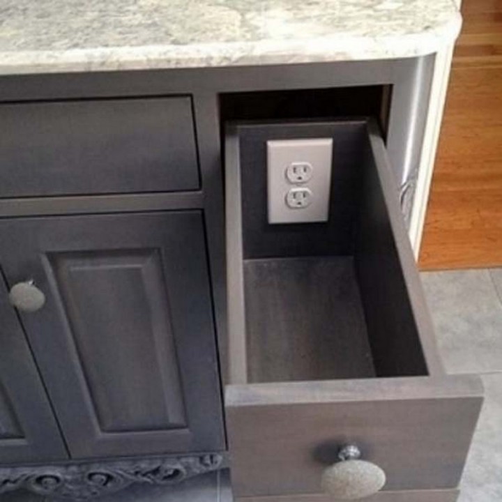 Keep your gadgets safe and out of view by installing electrical outlets inside a drawer - 37 Home Improvement Ideas