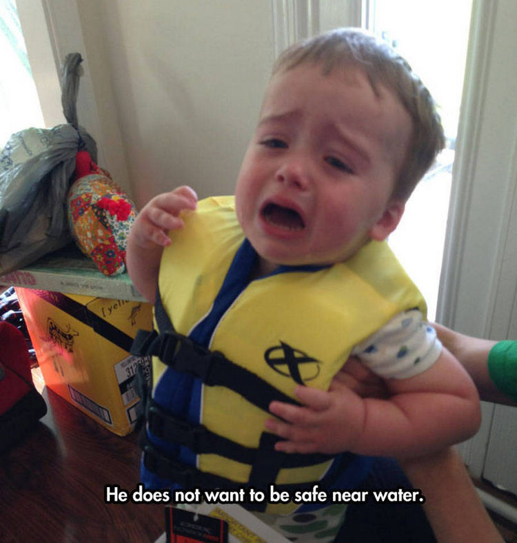 37 Photos of Kids Losing It - He does not want to be safe near water.