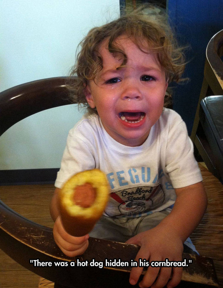 37 Photos of Kids Losing It - There was a hot dog hidden in his cornbread.