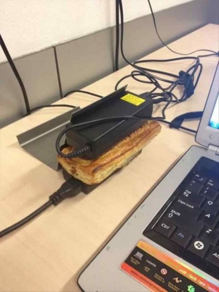 51 Crazy Life Hacks - Use a couple of laptop power cords to warm up your sandwich.