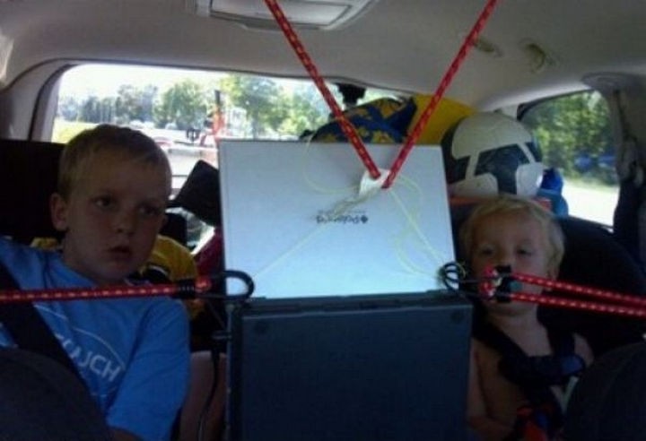 51 Crazy Life Hacks - Car trips are more fun with backseat laptop.