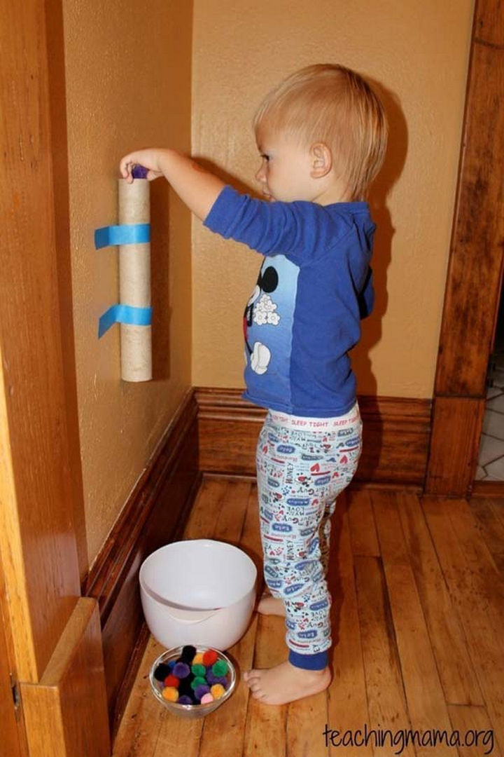 36 Summer Activities for Kids That Cost Less Than $10 - Tape a paper roll to a wall for a fun game for toddlers.
