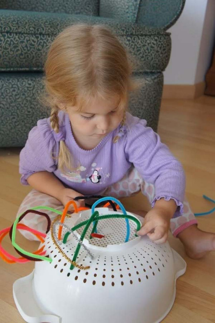 36 Summer Activities for Kids That Cost Less Than $10 - Fuzzy pipe cleaners and a colander can keep toddlers busy for hours.