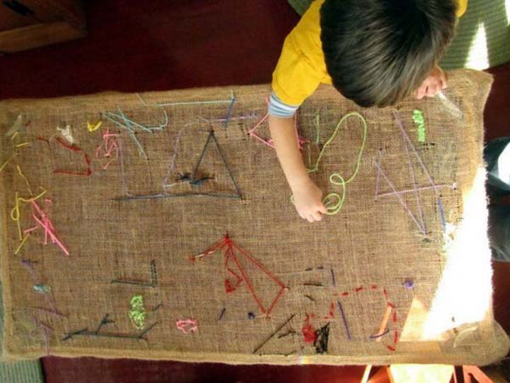 36 Summer Activities for Kids That Cost Less Than $10 - Use burlap to make a preschooler-friendly tapestry table.