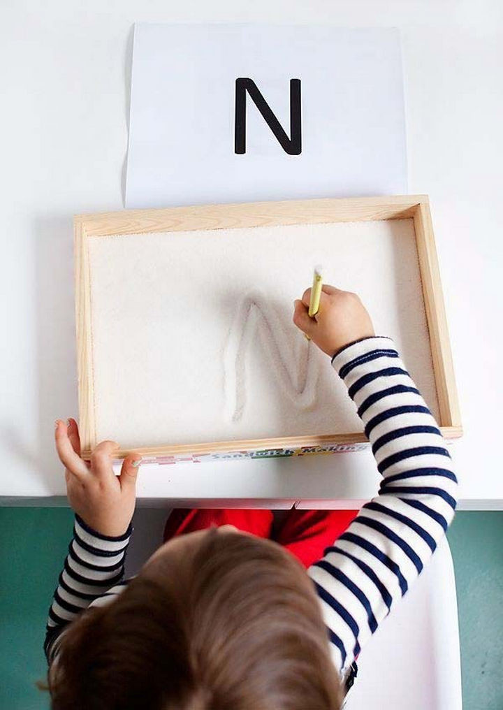36 Summer Activities for Kids That Cost Less Than $10 - Make learning fun with a sugar writing tray.