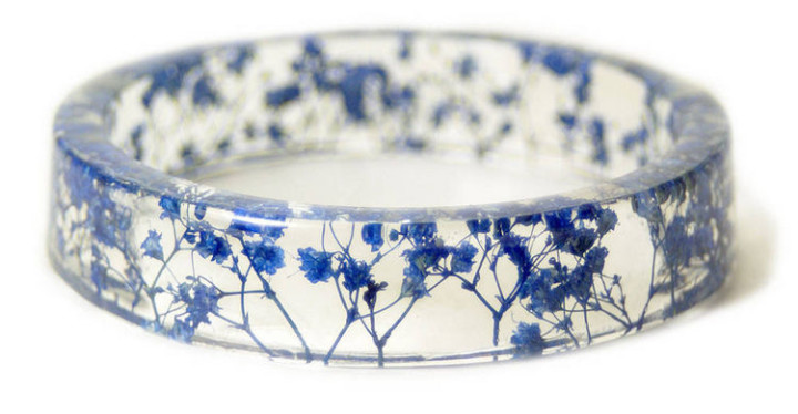 Each resin ring is made of beautiful dried flowers encased in resin.