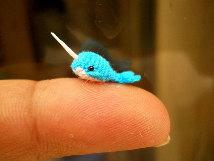 Stuffed crochet blue narwhal.