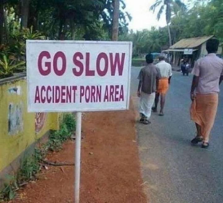 21 Funny Spelling Mistakes - "Go slow. Accident porn area."