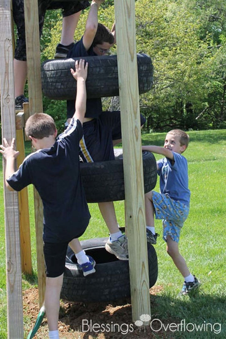 22 Awesome Ways to Turn Used Tires Into Something Great - Keep the kids entertained with a tire climbing tower.