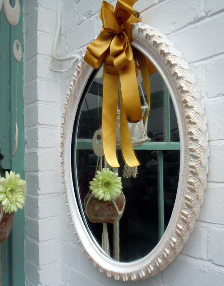 22 Awesome Ways to Turn Used Tires Into Something Great - Create a lovely mirror frame with a bicycle tire.