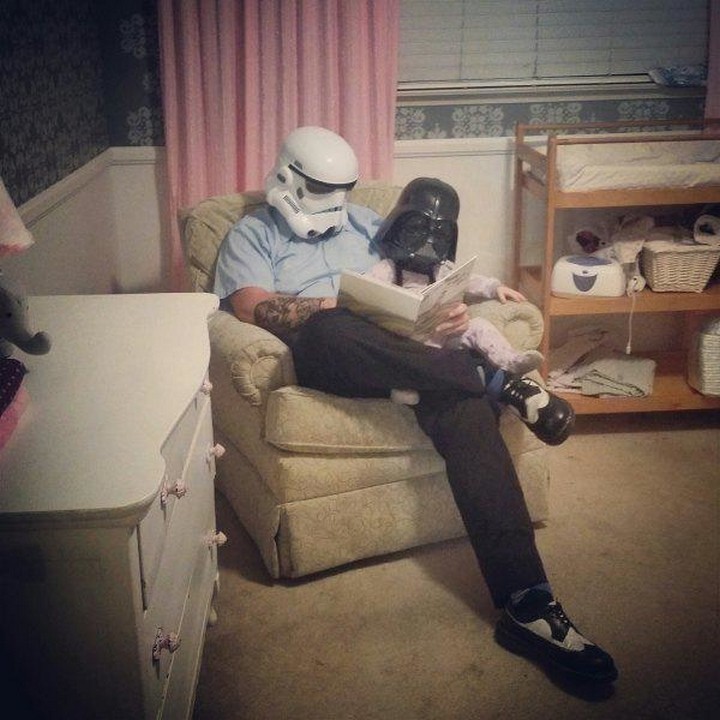 21 Hilarious Parents - Father and son Star Wars fans being swept in a book to a galaxy far, far away.