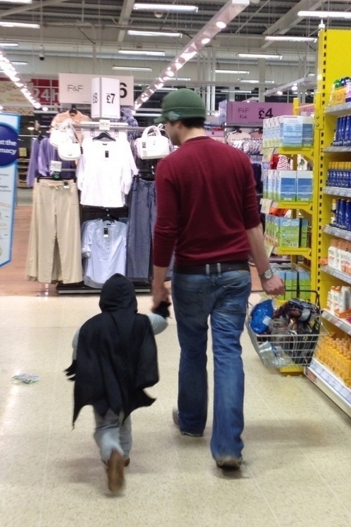 21 Hilarious Parents - Father shopping with his favorite little superhero.