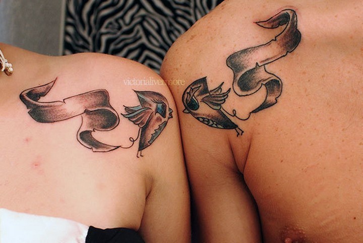 35 couple tattoos - Flying together couple tattoos.