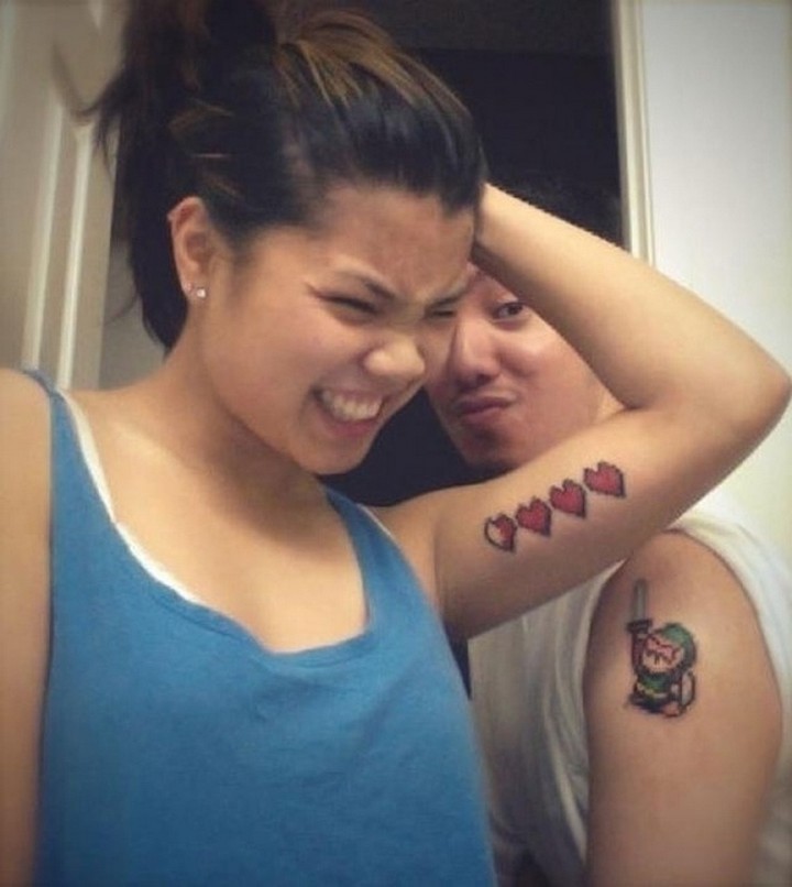 35 couple tattoos - Link and Zelda couple tattoos.