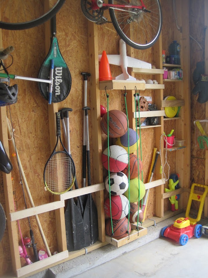 46 Useful Storage Ideas - Organize assorted sports balls using bungee cords.