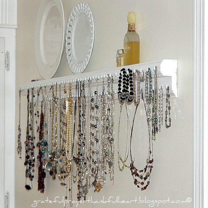 46 Useful Storage Ideas - Create a jewelry organizer shelf using tacks and a few pieces of wood trim.