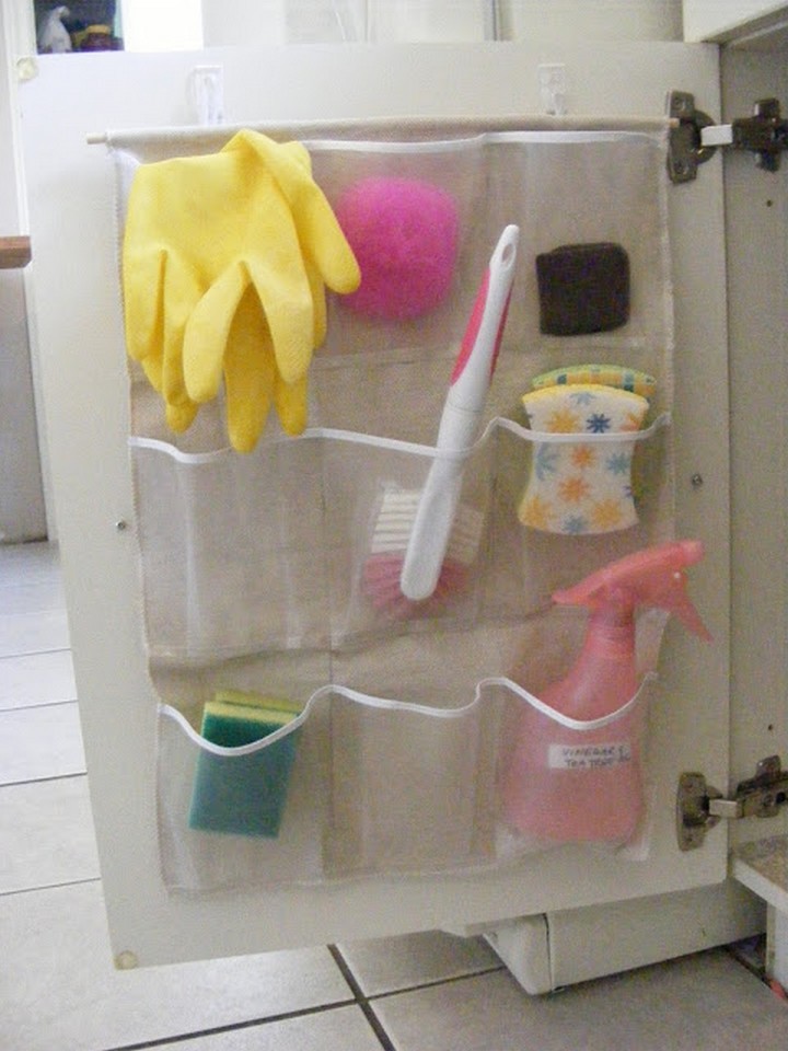 46 Useful Storage Ideas - Cut a shoe organizer in half and use it to store cleaning supplies under the sink.