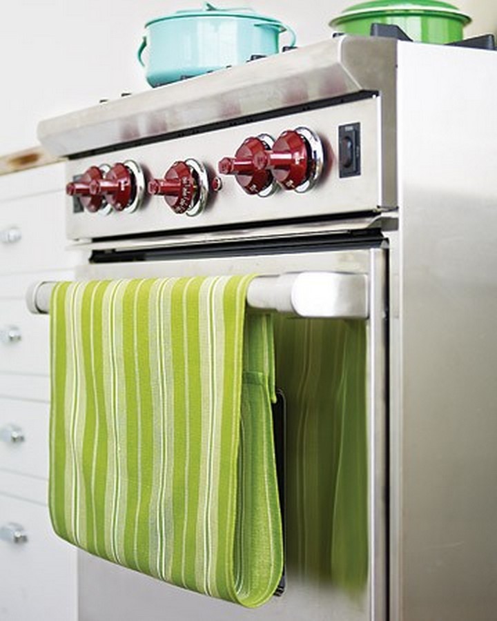 46 Useful Storage Ideas - Add a Velcro strip to your dish towels so it doesn't fall when hanging.